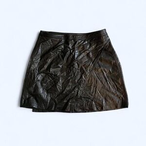 Black faux leather mini wrap skirt size 2 by Free People